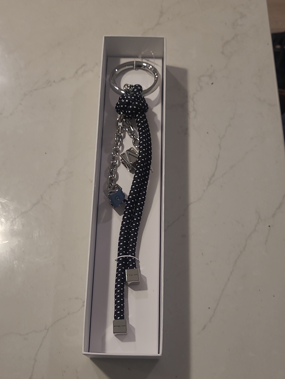 Black and White Braided Rope Keychain with Silver Accents